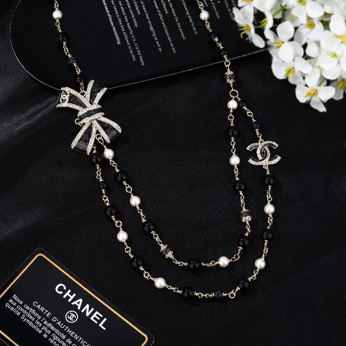 CHANEL 25S CHAIN BELT IN BLACK AND WHITE PEARL 614285